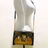 Picture of Louis Vuitton Reverse Monogram Trunk Clutch